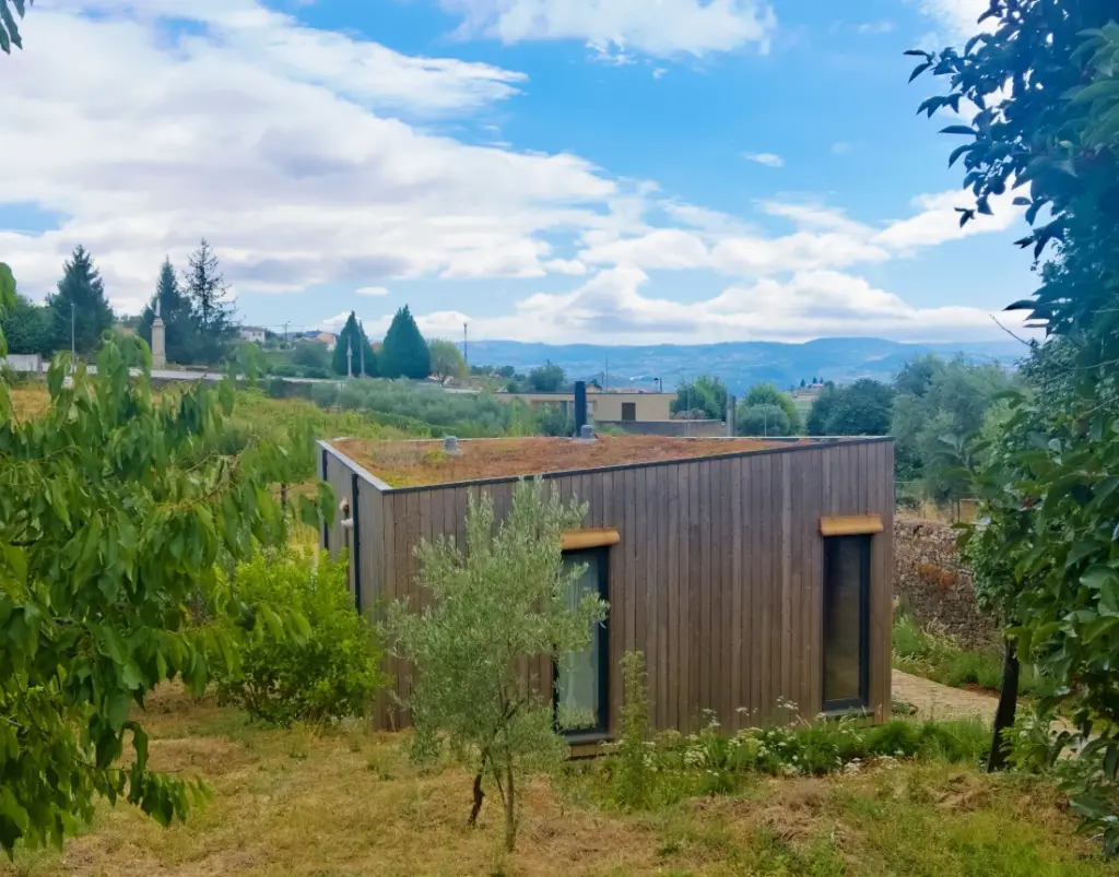 Garden roof over the wooden house