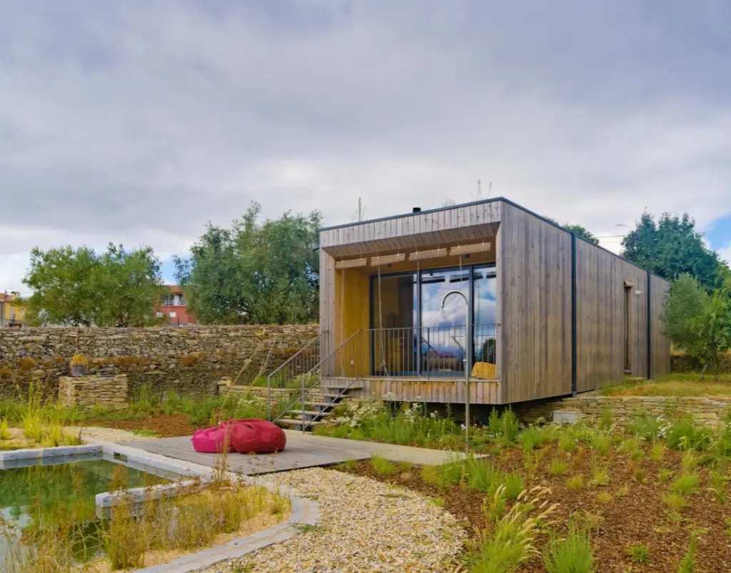 Wooden house with biological pool